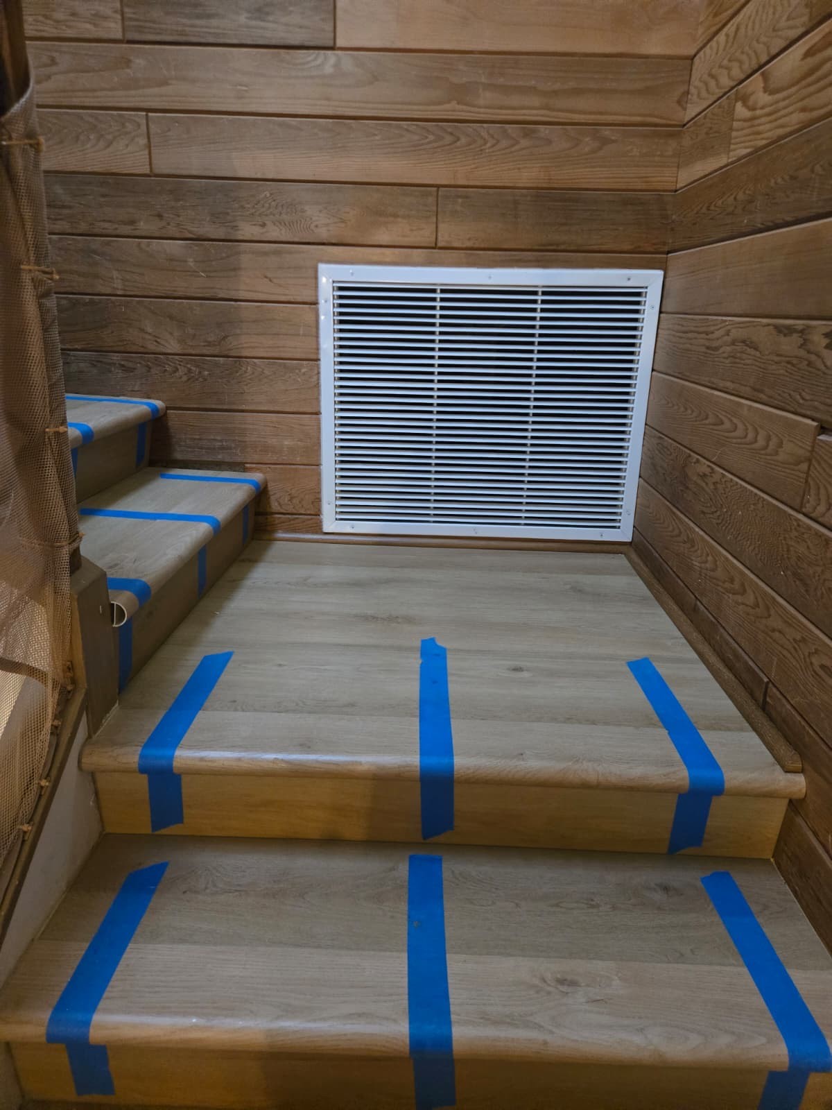 Taping off a staircase mid-install